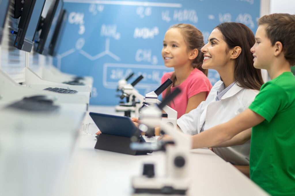 woman-children-sideways-camera-looking-screen